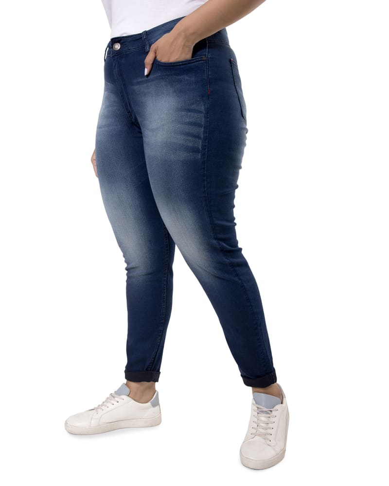 Side of a model wearing a size 40 PLUS SIZE WOMEN SHADED CASUAL NAVY BLUE JEANS in Navy by Instafab Plus. | dia_product_style_image_id:294288
